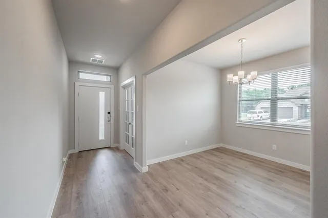 a view of a chandelier in a room