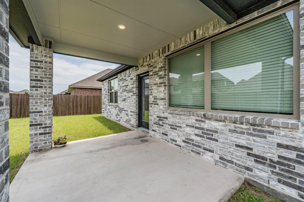 3202 Glorioso Drive Royse City, TX 75189 - Photo 4 of 40 a view of small house with a yard