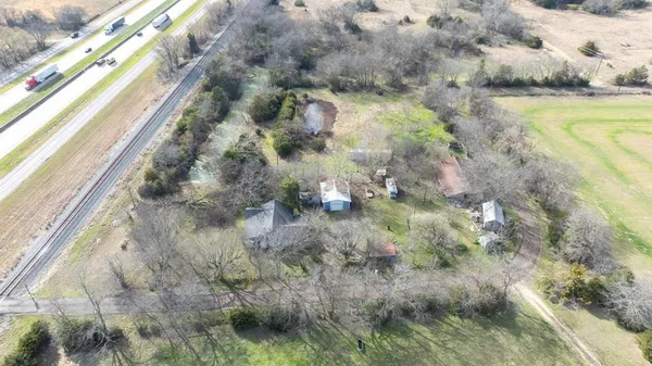 a view of a lake with a yard