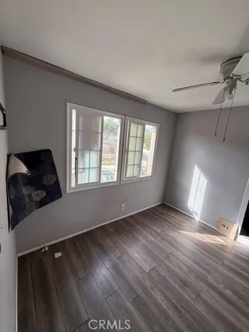 a bedroom with a bed and a walk in closet