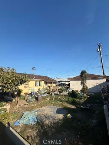 a view of a patio with swimming pool table and chairs
