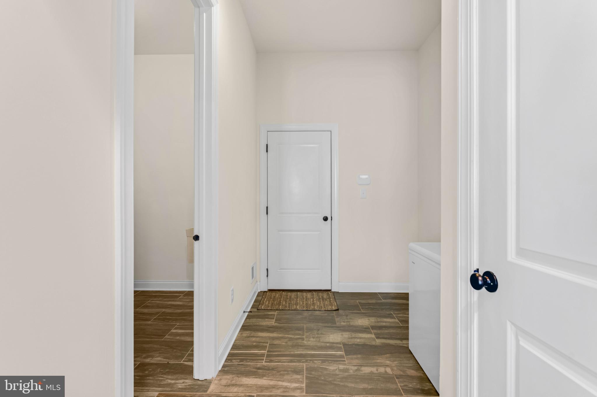 1045 Matthew Way New Castle, DE 19720 - Photo 18 of 62 a view of a bathroom from the hallway