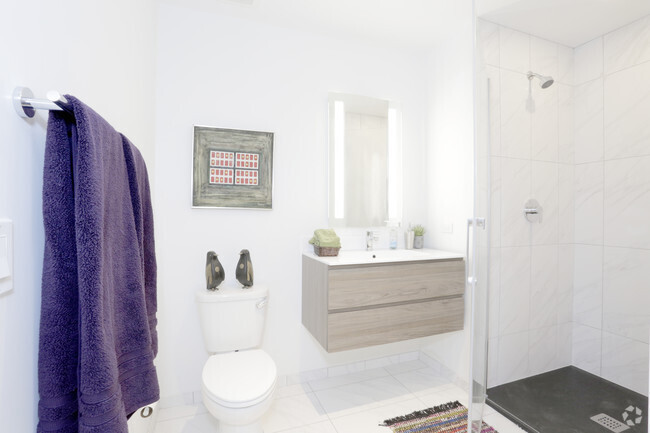 Undisclosed Address Chicago, IL 60642 - Photo 7 of 9 a bathroom with a toilet and a sink