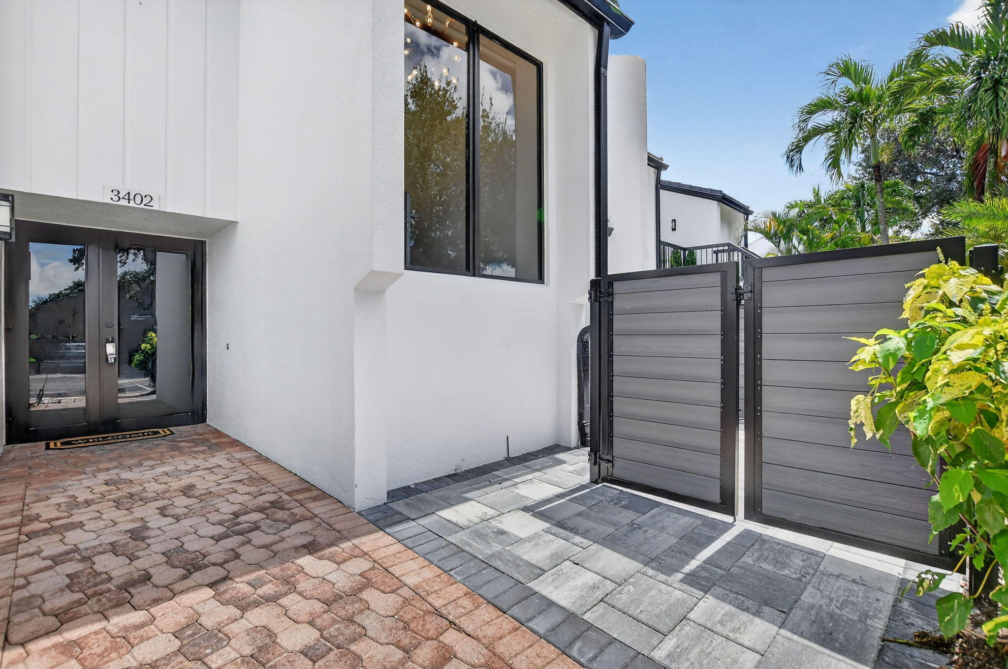 3402 Bridgewood Drive Boca Raton, FL 33434 - Photo 35 of 66 Front patio