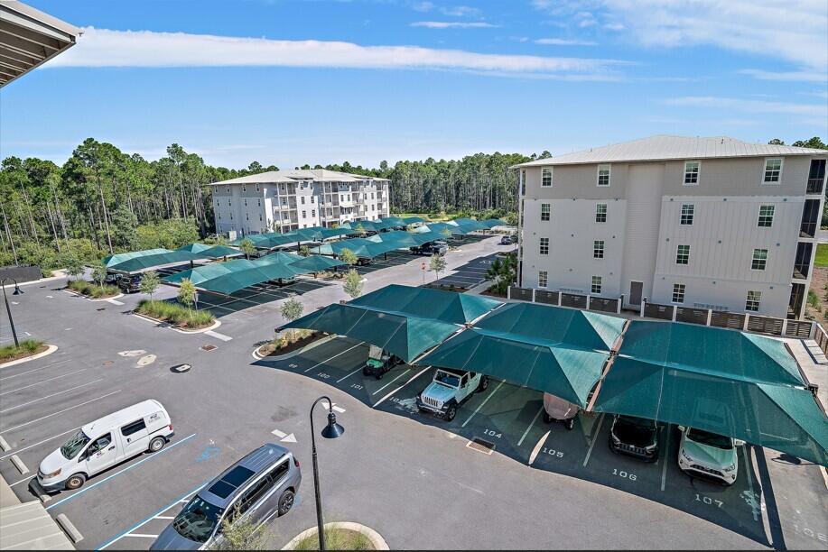 179 South County Highway 393, Unit 312 Santa Rosa Beach, FL 32459 - Photo 36 of 40 a view of a terrace with chairs