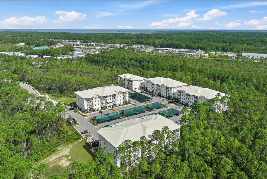 179 South County Highway 393, Unit 312 Santa Rosa Beach, FL 32459 - Photo 39 of 40 an aerial view of a house with yard lake and outdoor space
