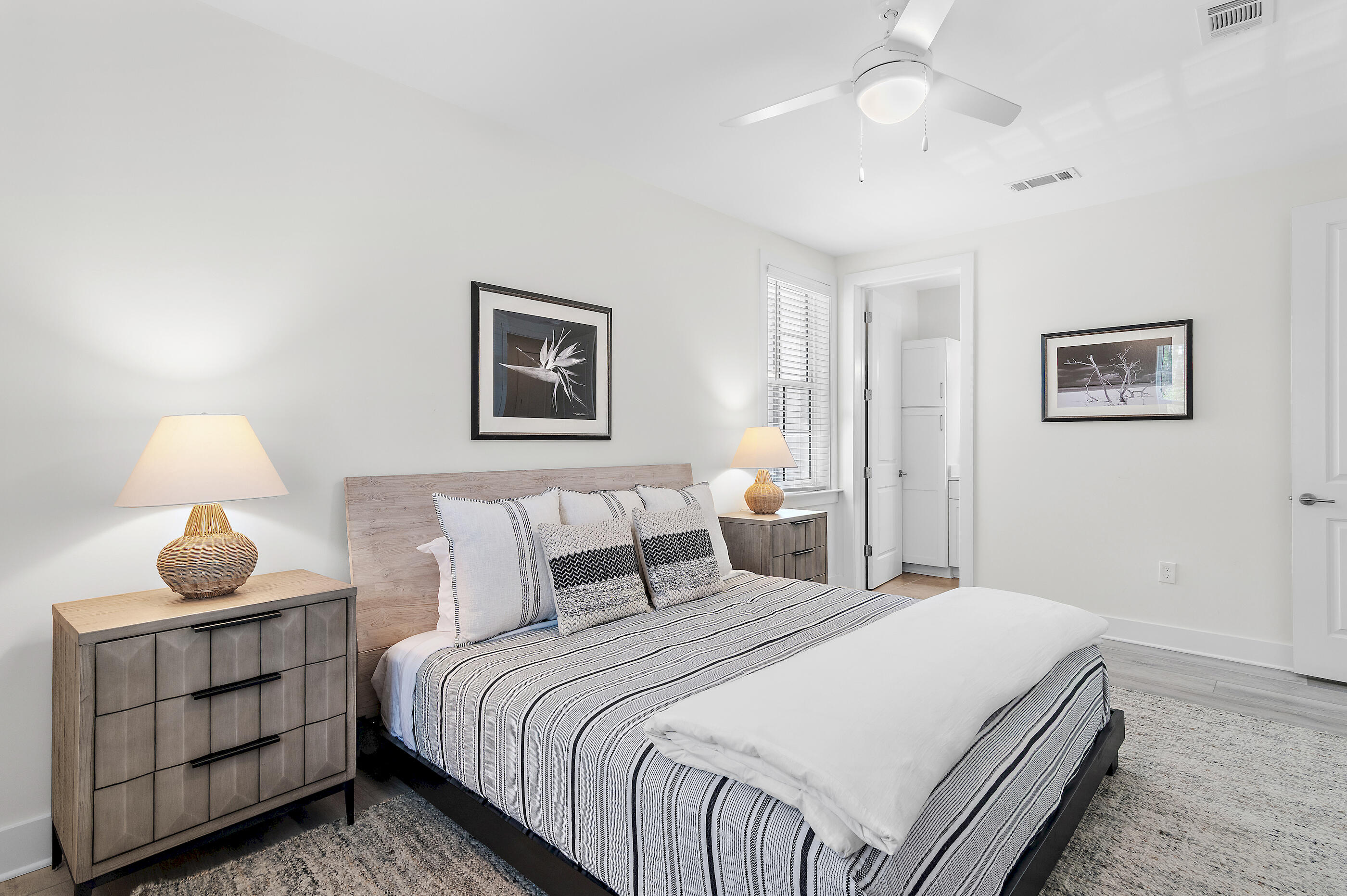 179 South County Highway 393, Unit 312 Santa Rosa Beach, FL 32459 - Photo 5 of 40 a bedroom with bed and window