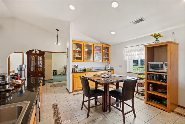 a view of a dining room with furniture
