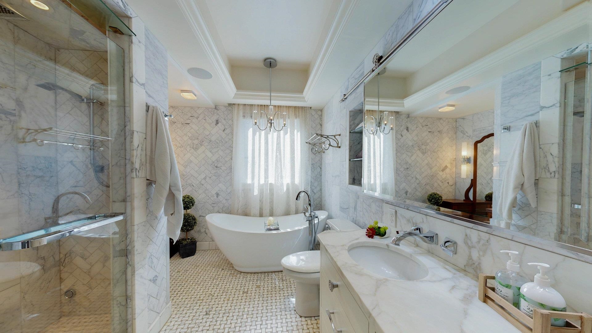 N1211 East Side Road Birchwood, WI 54817 - Photo 17 of 70 Full bath with a freestanding tub, vanity, a shower stall, tile walls, and light tile patterned floors