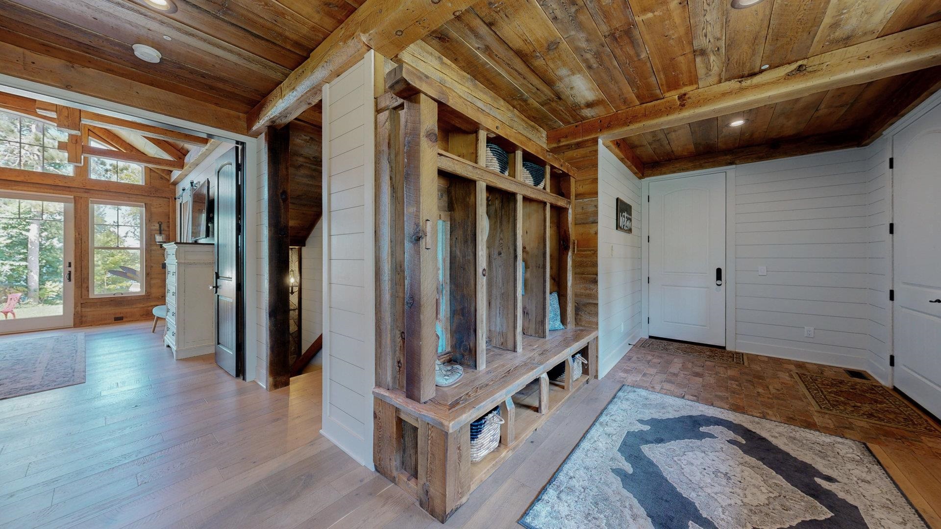 N1211 East Side Road Birchwood, WI 54817 - Photo 29 of 70 Mudroom featuring wooden walls, a wood ceiling with exposed beams, recessed lighting, and hardwood / wood-style floors