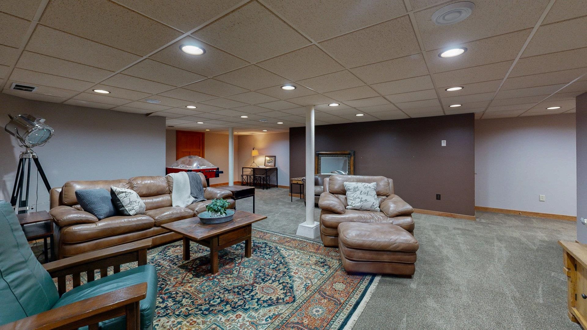 N1211 East Side Road Birchwood, WI 54817 - Photo 48 of 70 Living area with a paneled ceiling, carpet floors, and recessed lighting
