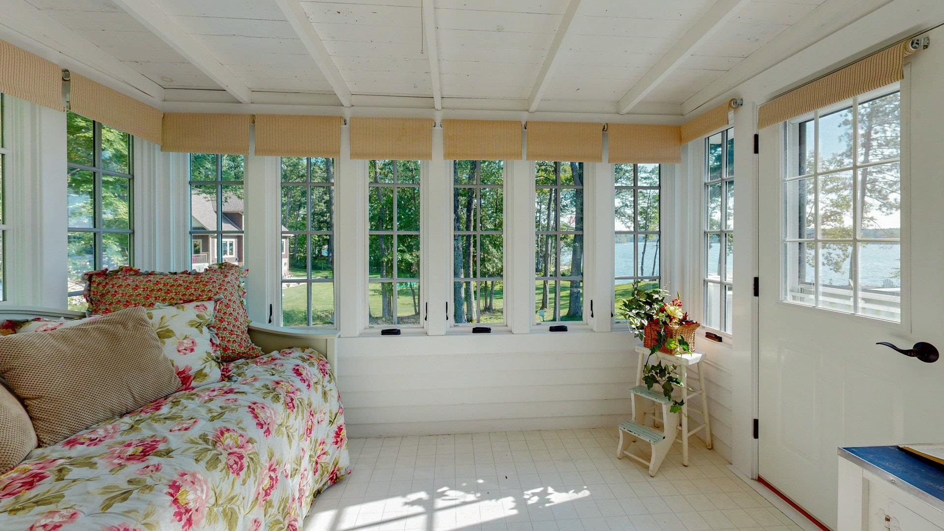 N1211 East Side Road Birchwood, WI 54817 - Photo 60 of 70 Sunroom featuring a wooden ceiling with exposed beams