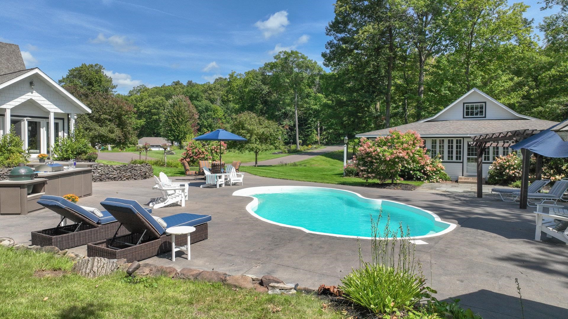 N1211 East Side Road Birchwood, WI 54817 - Photo 6 of 70 Swimming pool featuring a patio and a lawn