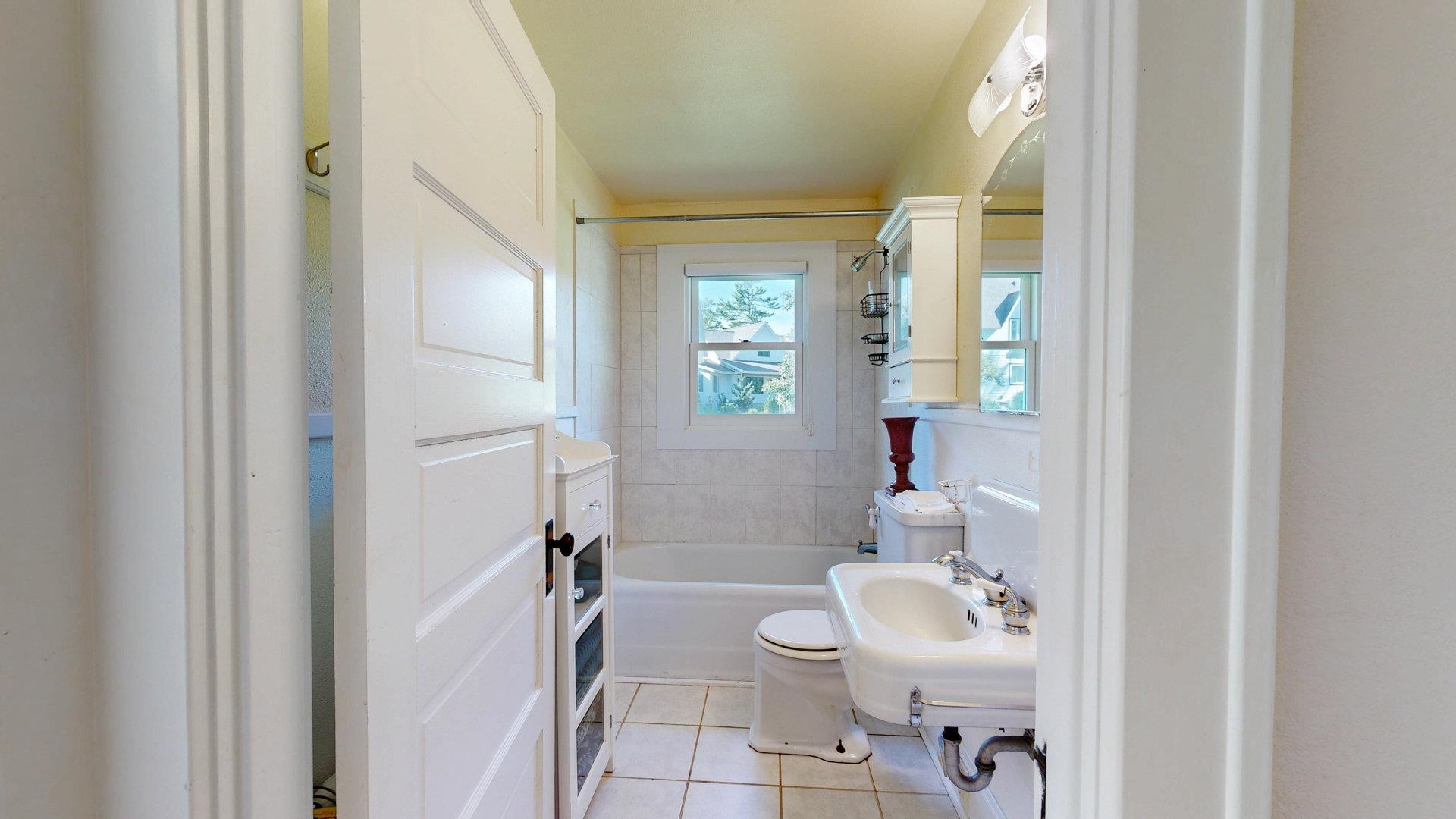 N1211 East Side Road Birchwood, WI 54817 - Photo 65 of 70 Bathroom featuring light tile patterned flooring and shower / bath combo
