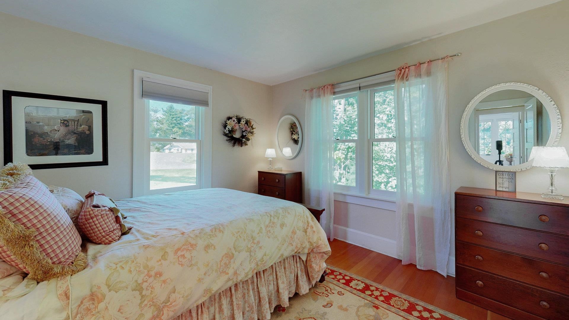 N1211 East Side Road Birchwood, WI 54817 - Photo 66 of 70 Bedroom featuring multiple windows and light wood finished floors