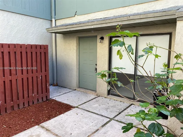 a view of a wooden fence