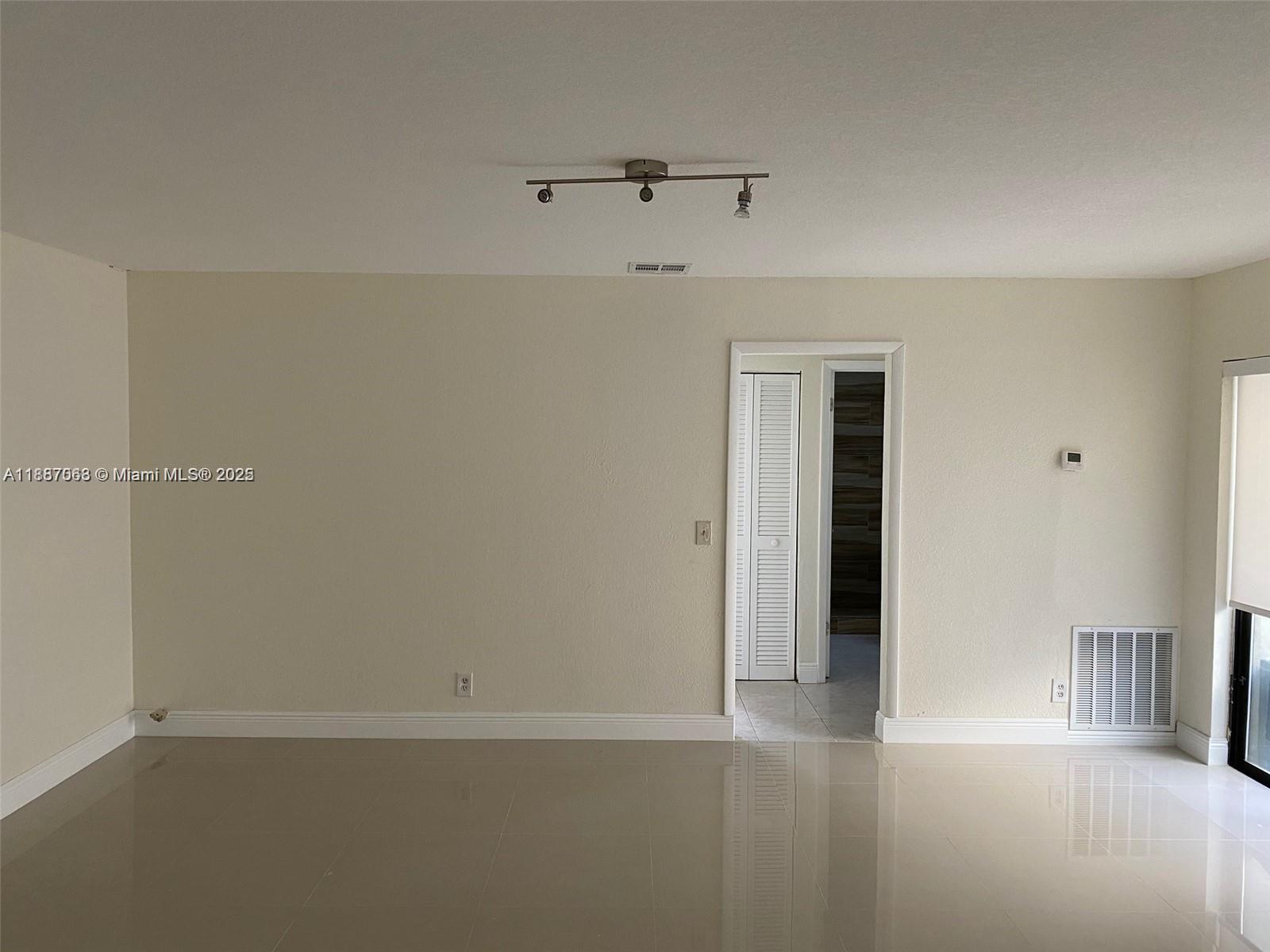 26 Crossings Circle, Unit B Boynton Beach, FL 33435 - Photo 8 of 15 a view of an empty room