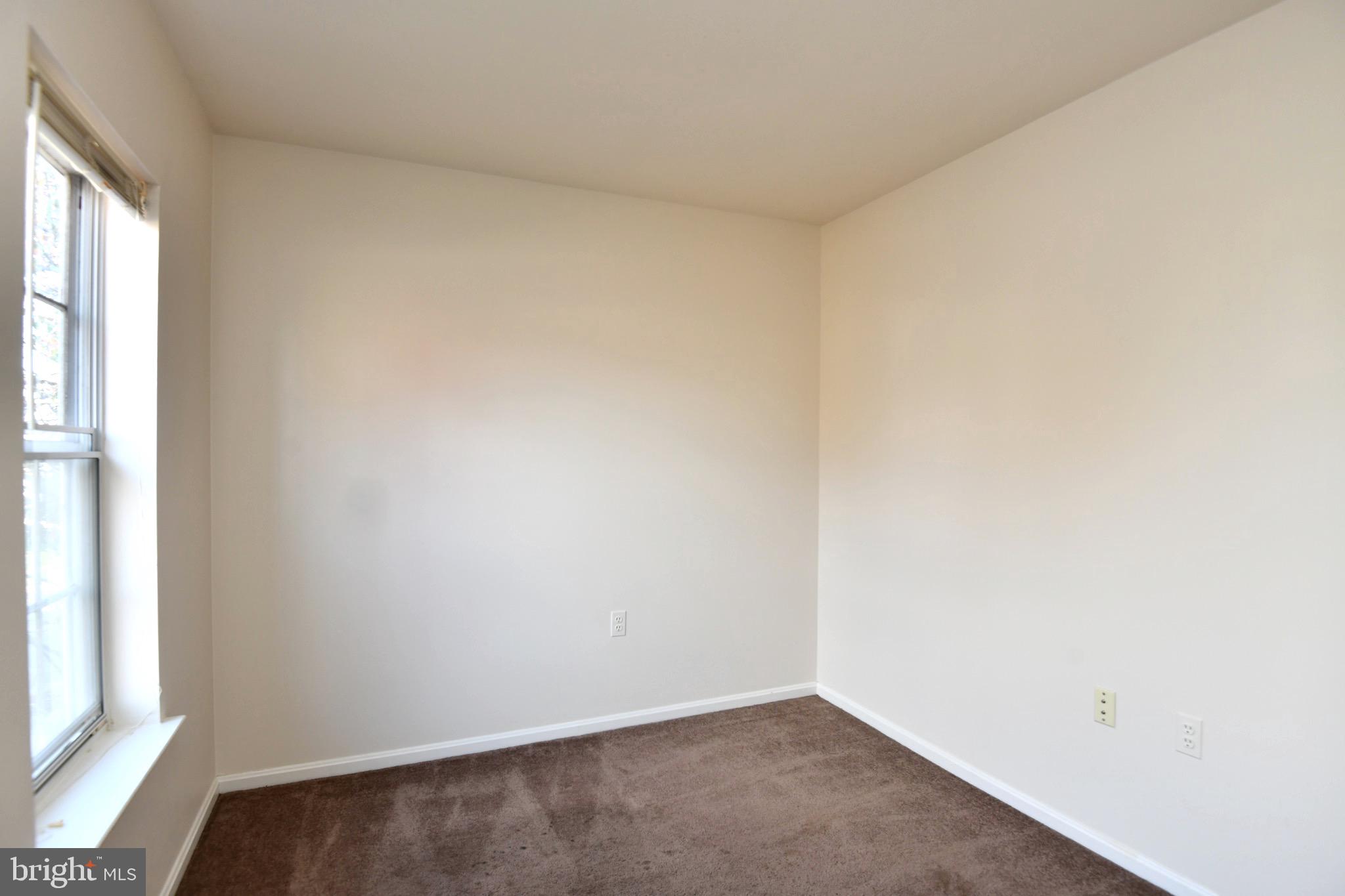 1052 Jeff Ryan Drive Herndon, VA 20170 - Photo 12 of 13 an empty room with windows