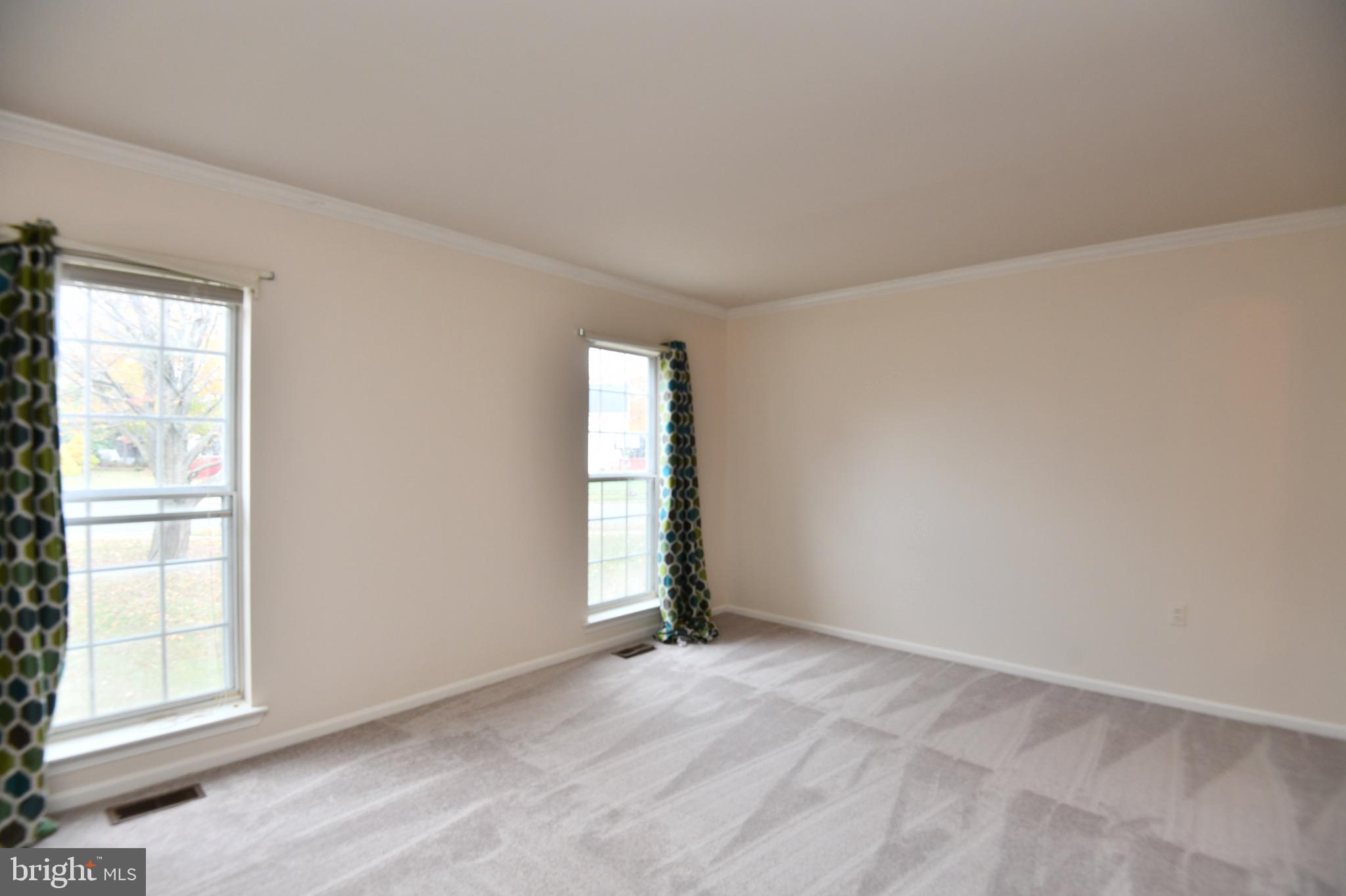 1052 Jeff Ryan Drive Herndon, VA 20170 - Photo 3 of 13 an empty room with windows