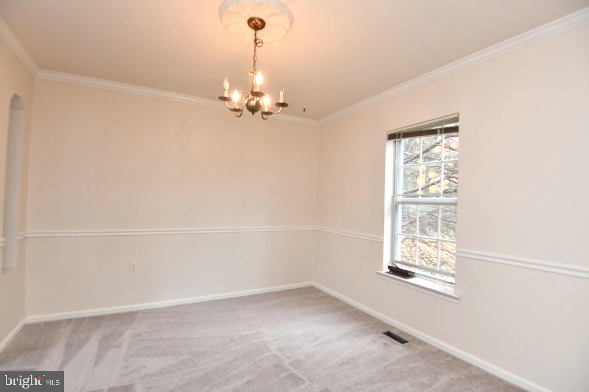 1052 Jeff Ryan Drive Herndon, VA 20170 - Photo 4 of 13 an empty room with a windows