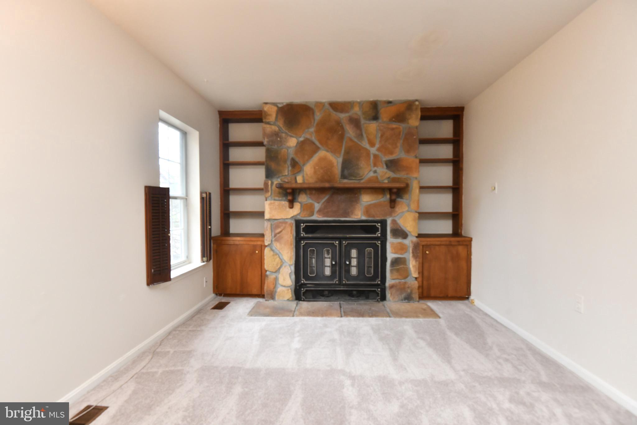 1052 Jeff Ryan Drive Herndon, VA 20170 - Photo 8 of 13 a view of empty room with a fireplace