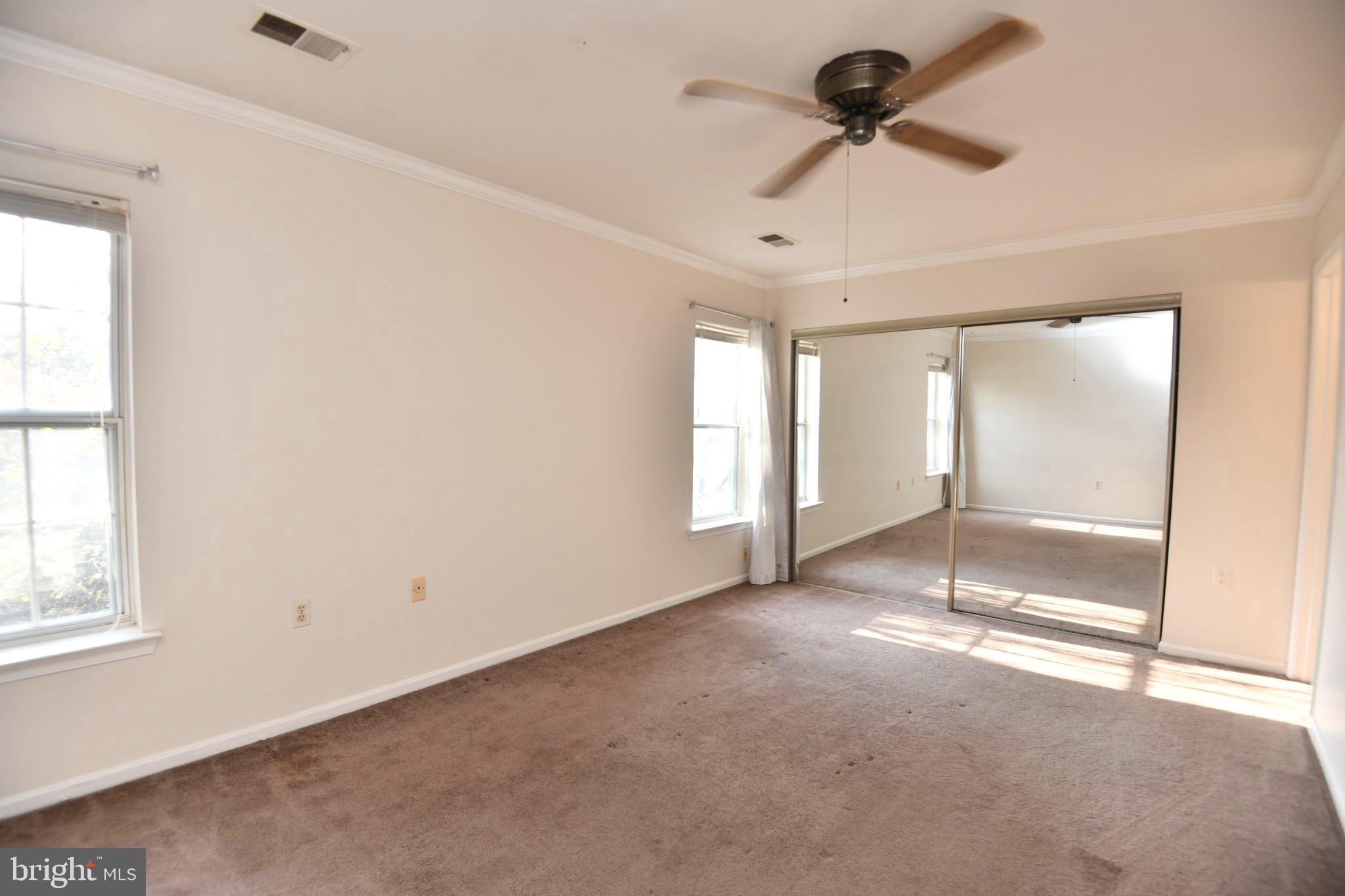 1052 Jeff Ryan Drive Herndon, VA 20170 - Photo 9 of 13 a view of an empty room with a window