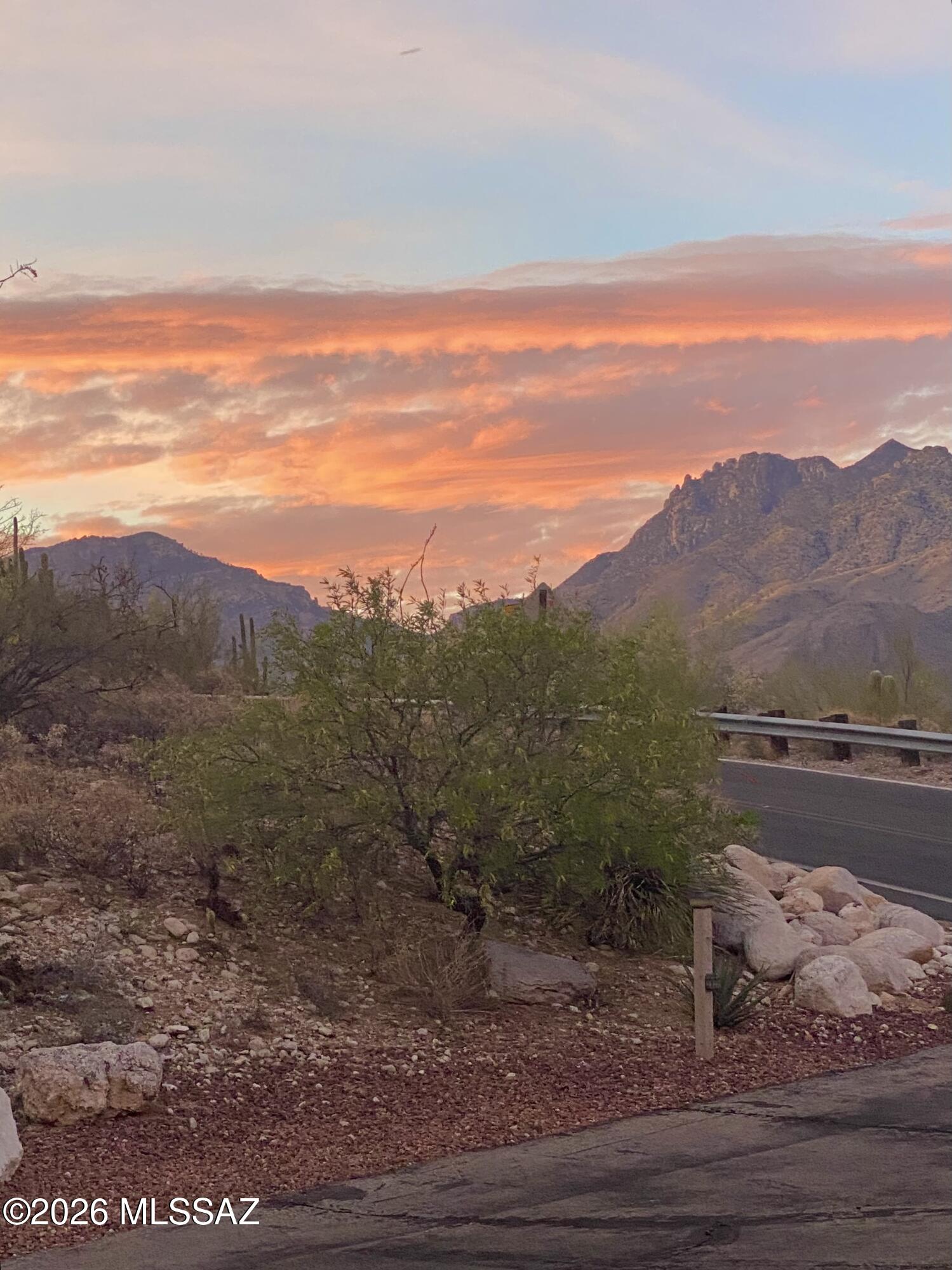 4641 North Rockcliff Road Tucson, AZ 85750 - Photo 42 of 48 As the sun sets, front yard of Rockcliff House