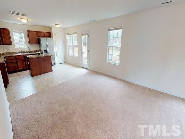 2800 Smooth Stone Trail Raleigh, NC 27610 - Photo 2 of 16 a view of kitchen with furniture and windows
