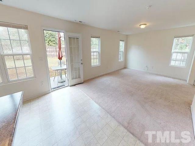 2800 Smooth Stone Trail Raleigh, NC 27610 - Photo 6 of 16 an empty room with windows and closet