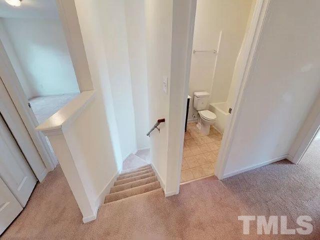 2800 Smooth Stone Trail Raleigh, NC 27610 - Photo 7 of 16 a view of a hallway view with staircase
