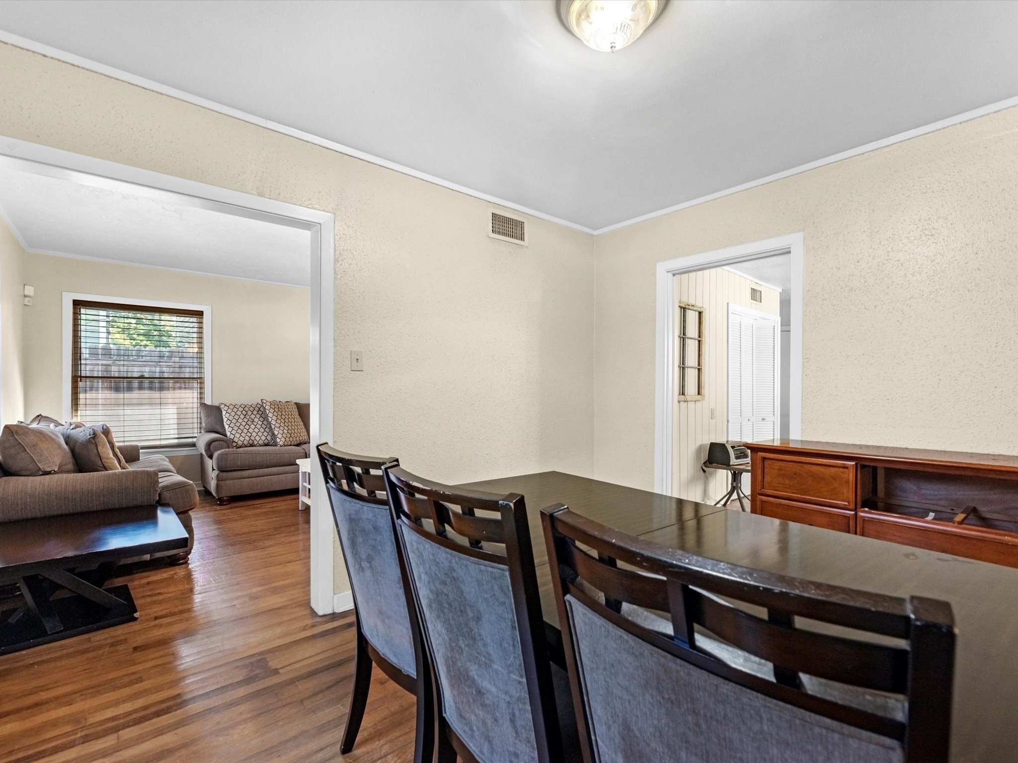 2406 Charleston Street Houston, TX 77021 - Photo 8 of 28 Dining room area, also complete with hardwood floors!