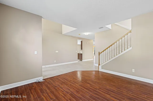 a view of livingroom with hardwood floor and window