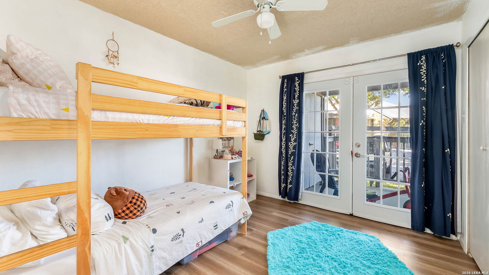 14343 Judson Road, Unit 1201 San Antonio, TX 78233 - Photo 6 of 11 a bedroom with a bed and a window