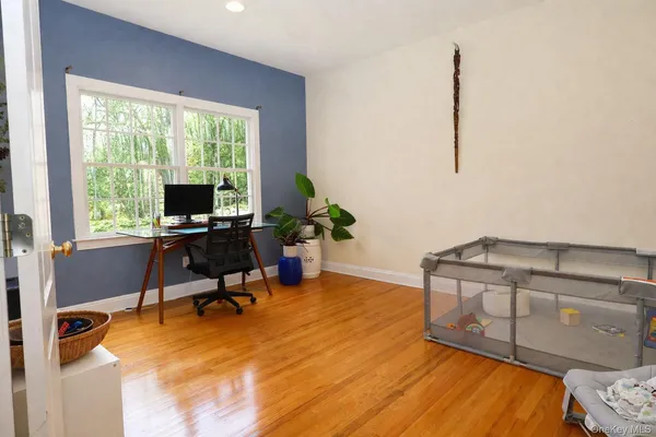 a bedroom with a bed and lamp