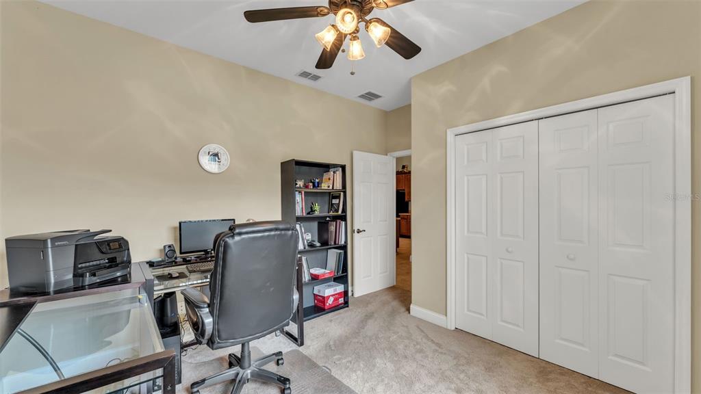 730 Country Walk Cove Eagle Lake, FL 33839 - Photo 14 of 38 a view of a workspace with furniture