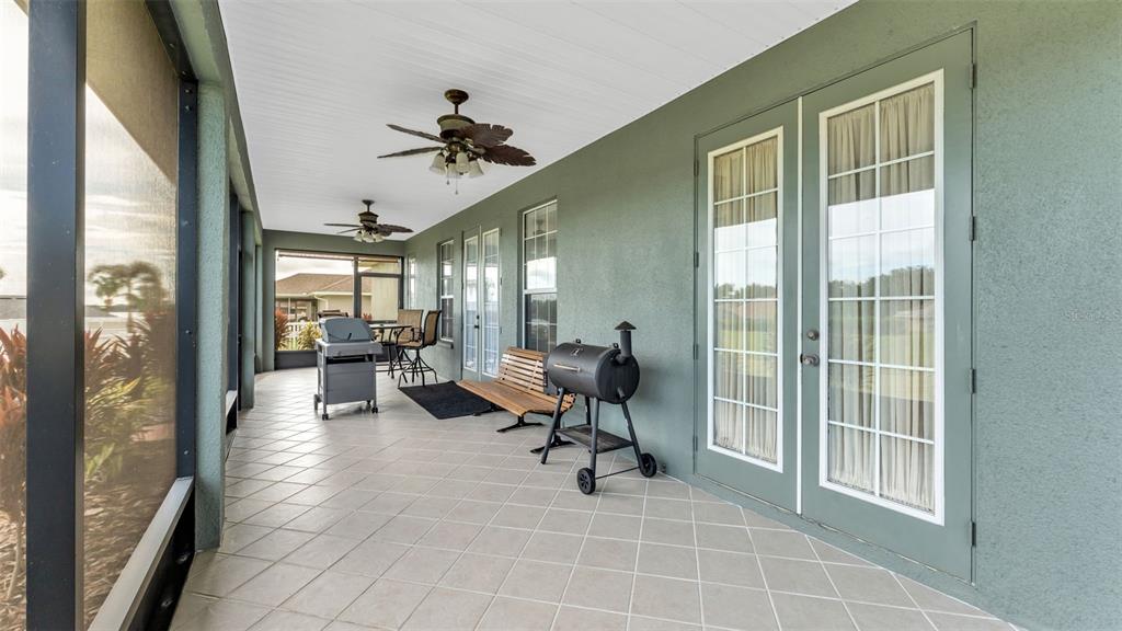 730 Country Walk Cove Eagle Lake, FL 33839 - Photo 28 of 38 a view of a livingroom with couch and dining area