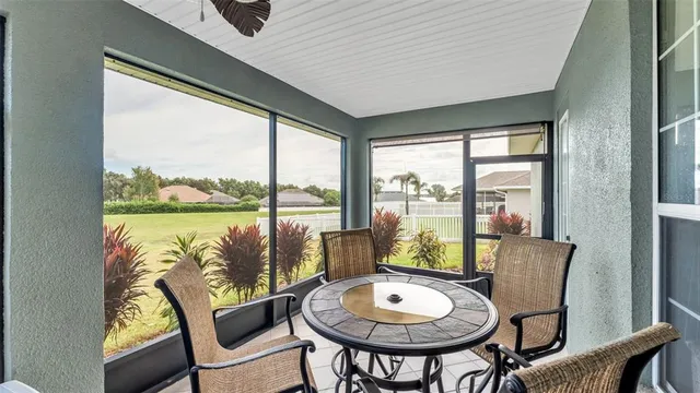 a view of a city from a dining room with furniture window and outside view