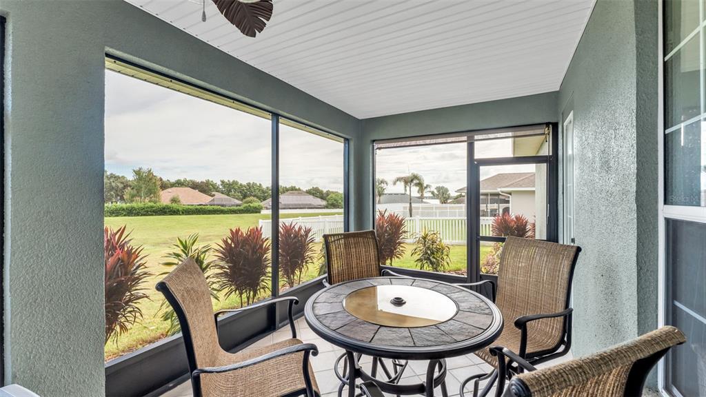 730 Country Walk Cove Eagle Lake, FL 33839 - Photo 30 of 38 a view of a city from a dining room with furniture window and outside view