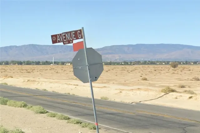 a view of ocean and mountain