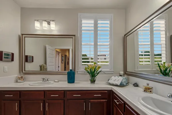 a bathroom with a toilet a sink and bathtub