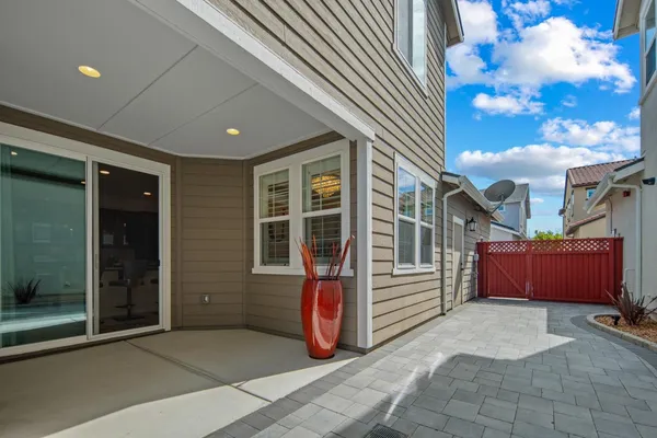 a small white building with a outdoor space