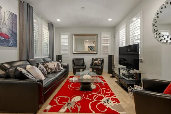 a living room with furniture and a couch