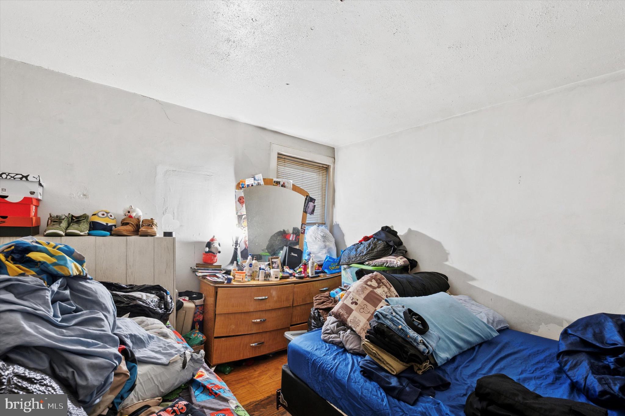 331 North 10th Street Darby, PA 19023 - Photo 4 of 15 a room with furniture and a window