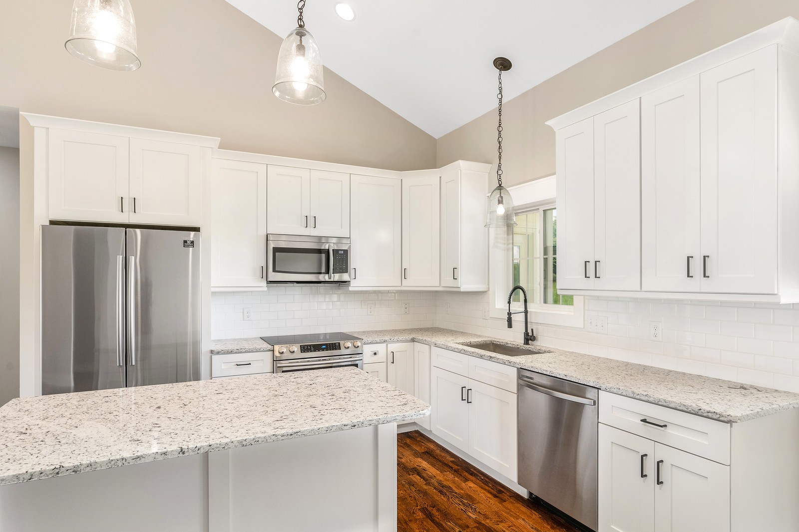 531 Martin Chapel Road Portland, TN 37148 - Photo 8 of 19 a kitchen with kitchen island a sink stainless steel appliances and white cabinets