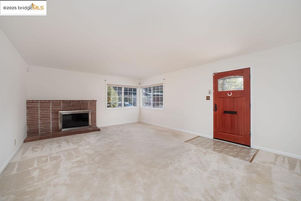 1651 Michael Drive Pinole, CA 94564 - Photo 3 of 21 an empty room with windows