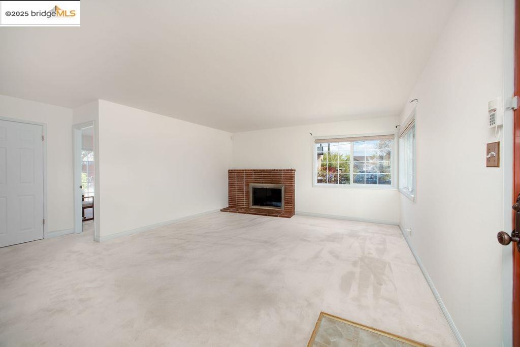 1651 Michael Drive Pinole, CA 94564 - Photo 4 of 21 an empty room with windows