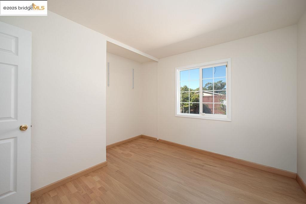 1651 Michael Drive Pinole, CA 94564 - Photo 9 of 21 an empty room with a window