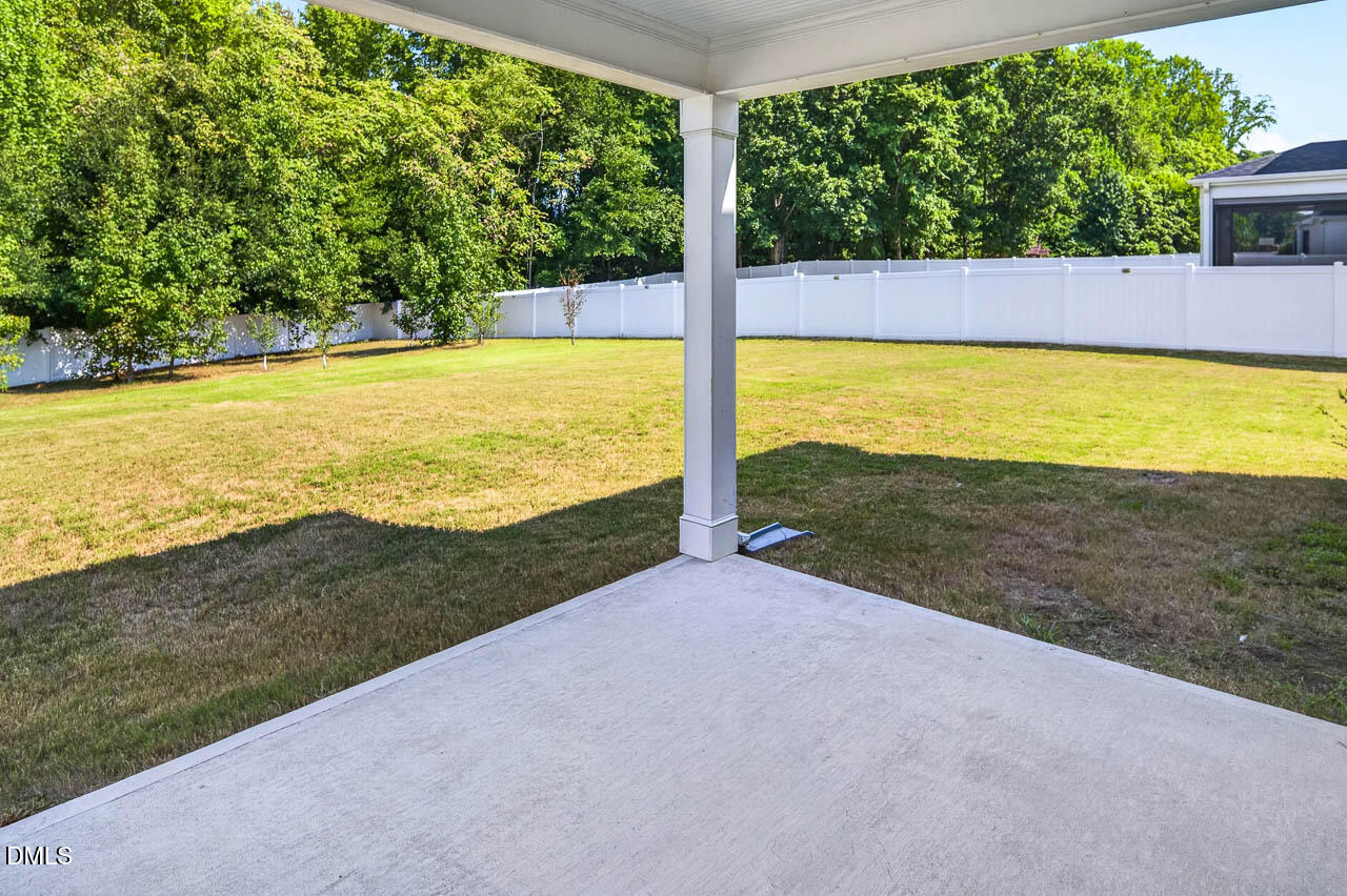 248 Kavanaugh Road Wake Forest, NC 27587 - Photo 46 of 54 View of back side yard from the covered porch