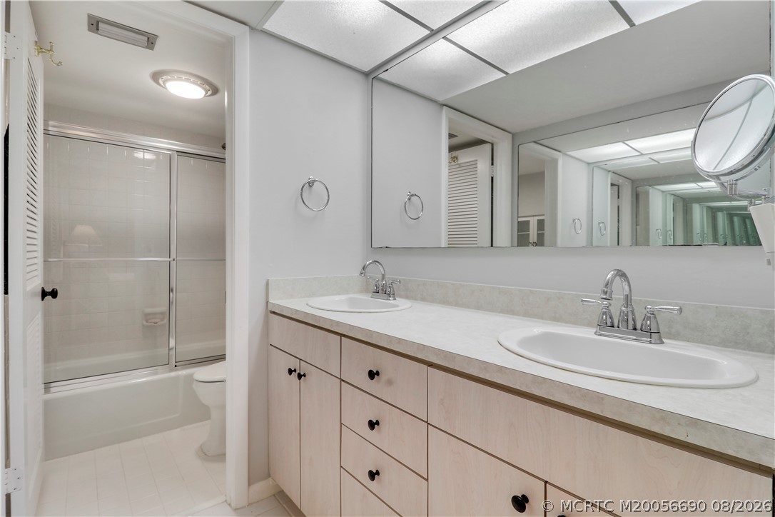 1862 Southwest Palm City Road, Unit 103 Stuart, FL 34994 - Photo 19 of 29 primary bathroom with double sinks