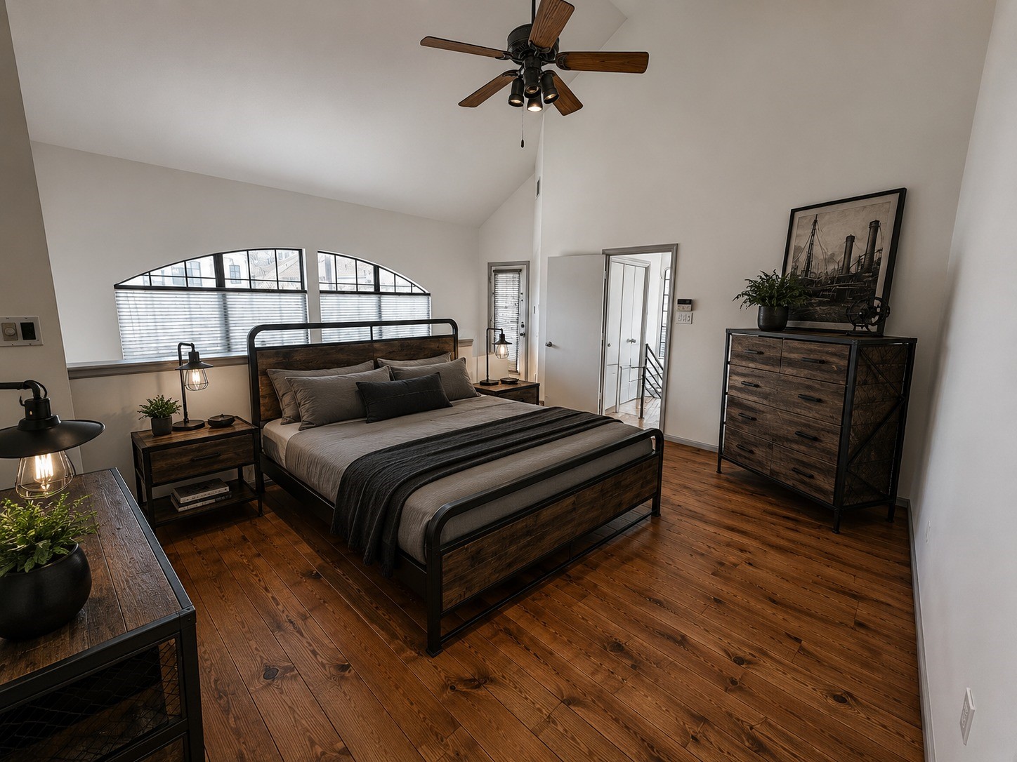 1213 Dunlavy Street Houston, TX 77019 - Photo 19 of 27 a bedroom with a bed and wooden floor